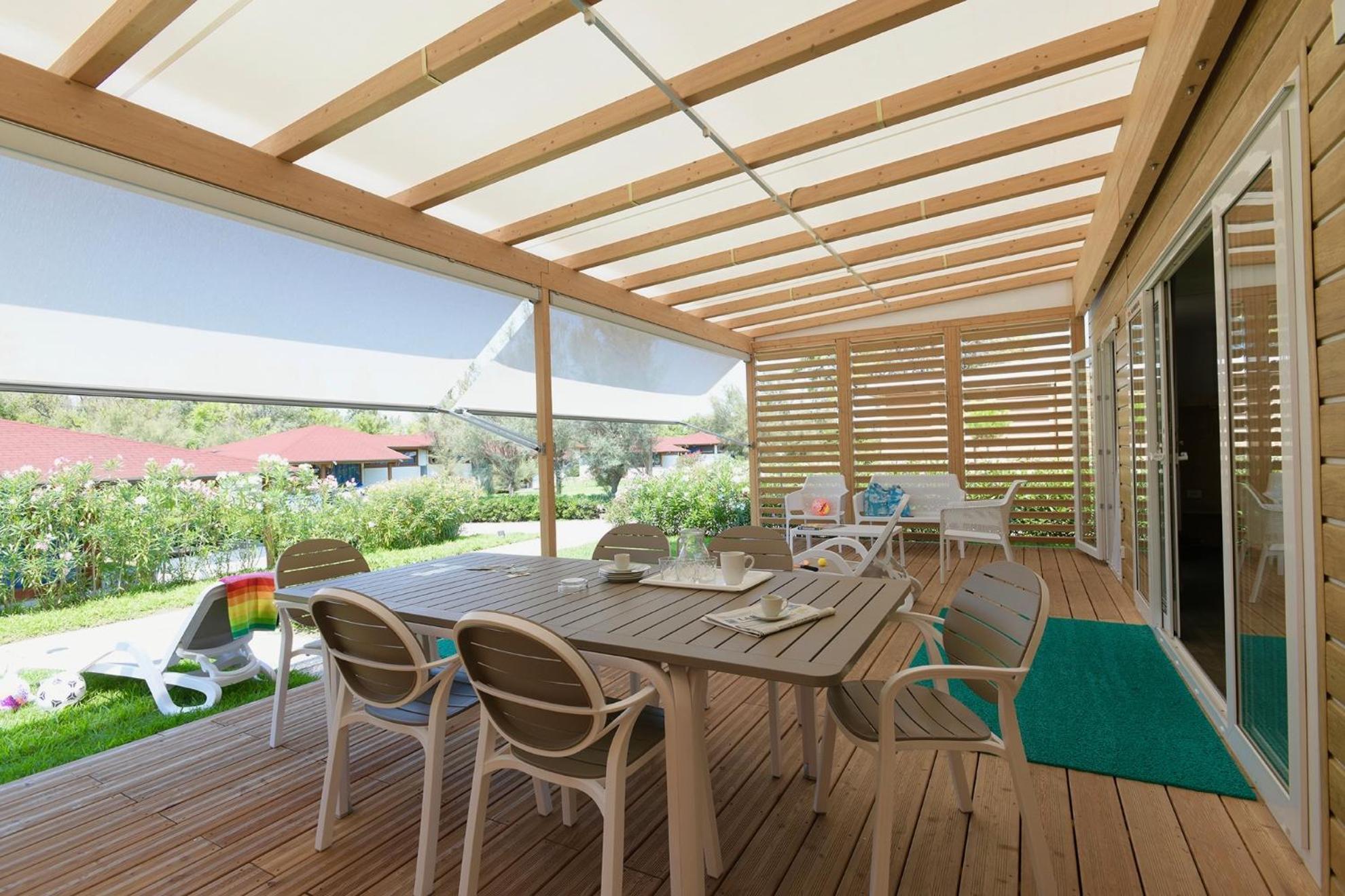 Isamar Holiday Village Ca Lino Pokój zdjęcie A pergola with a retractable awning